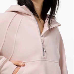 Scuba Half Zip from Lululemon. 
Color: Feather Pink 
Size: M/L